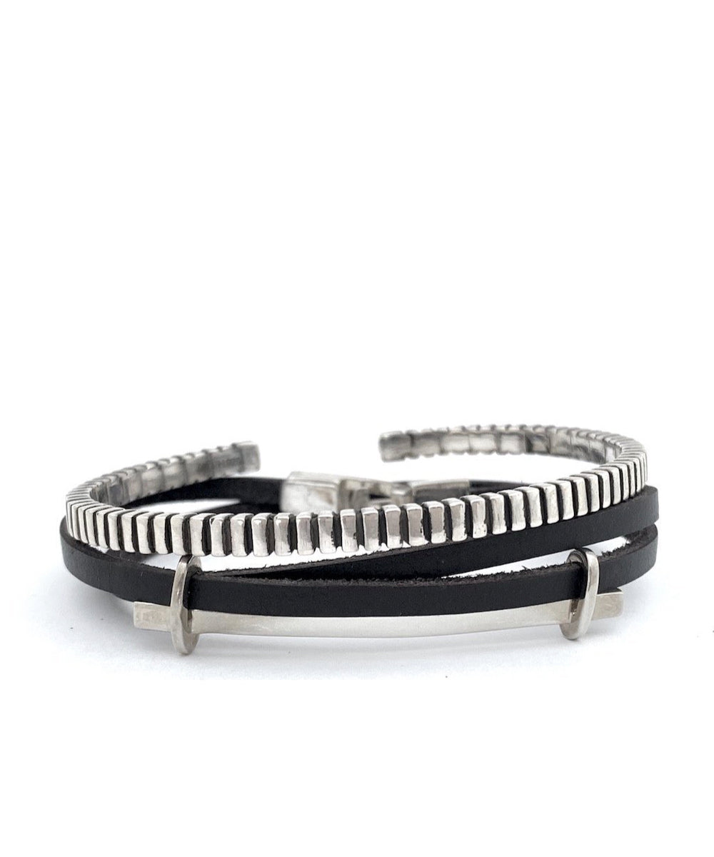 Stack of leather and silver bracelet